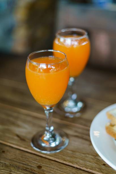istock glass of orange juice 2155097460