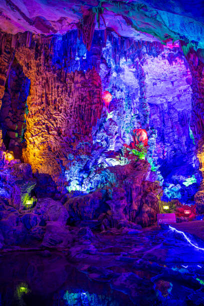 istock The beautifully illuminated Reed flute cave displaying stalactite formations. 2155097531