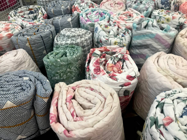 istock Bed linen top view. Covers for sleeping. Blanket exhibition. Duvet. Blankets and sheets. Bed linen. Sleep in comfort. Colorful blanket. Multi colored blankets 2155097668