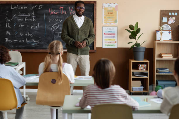 istock Young Black Man Teaching English Language 2155097693