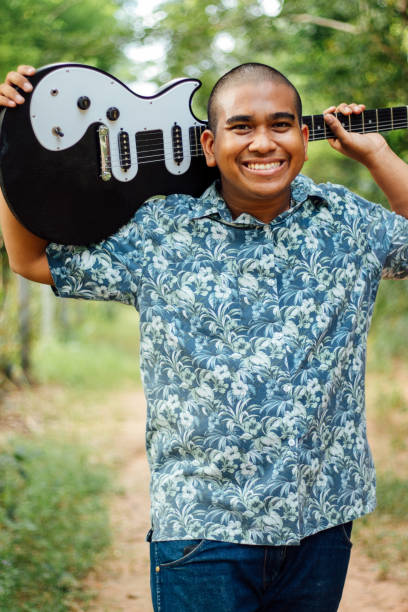 Thai male guitarist