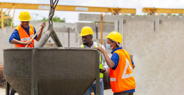 istock Construction workers at work, Foreman and worker team discussing at precast concrete factory site 2155098819