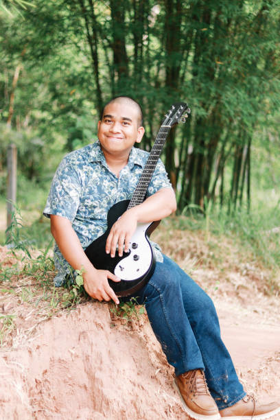 istock Thai male guitarist 2155098907