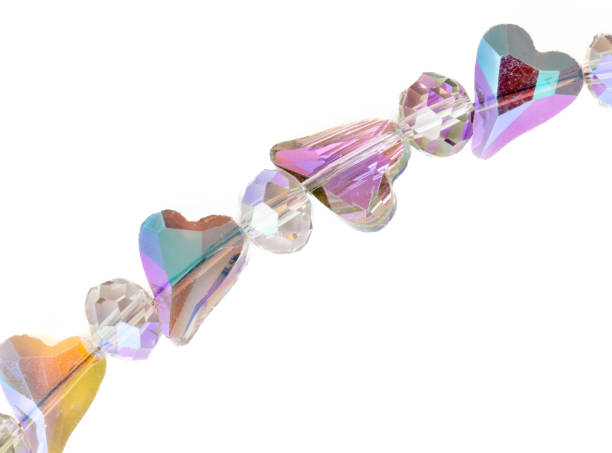istock Gemstones hearts on a chain isolated on white background 2155108189