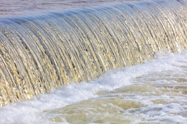 Waterfall on the river in winter as a background.
