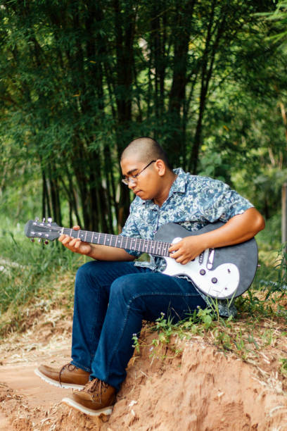istock Thai male guitarist 2155109438