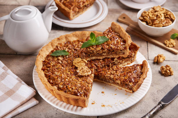 istock Tart with walnuts and caramel cream filling. 2155109544