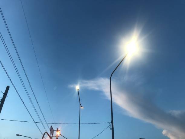 istock Electric pole and cable  on the blue sky 2155111091