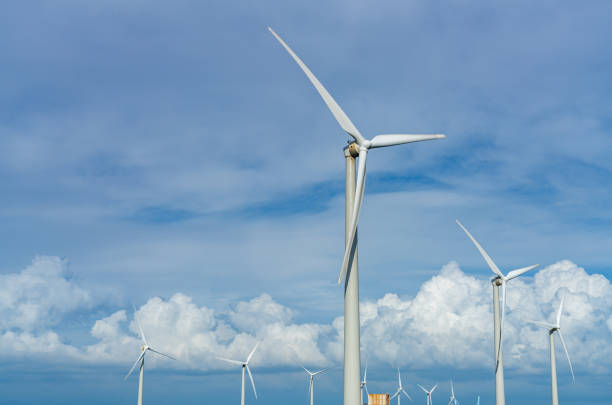 istock Wind turbines or wind energy converter in sunny day 2155114328
