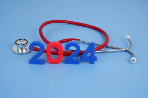 istock Stethoscope and numbers 2024 on blue background. 2155114690