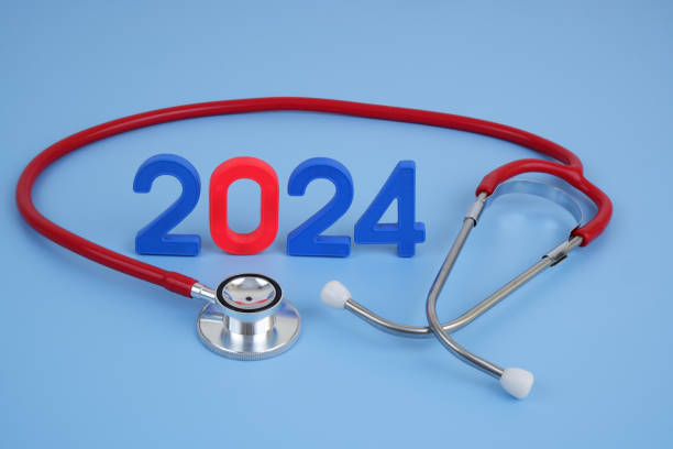 istock Stethoscope and numbers 2024 on blue background. 2155114696