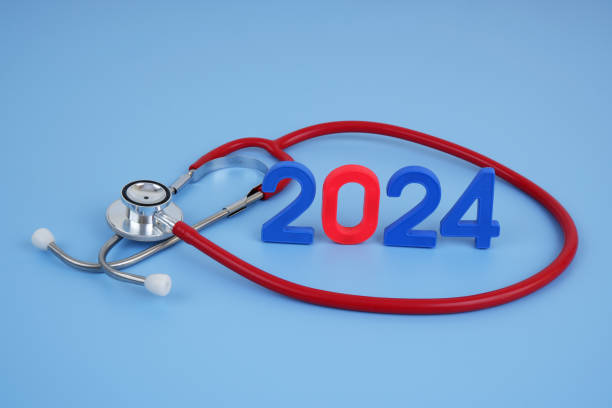 istock Stethoscope and numbers 2024 on blue background. 2155114744