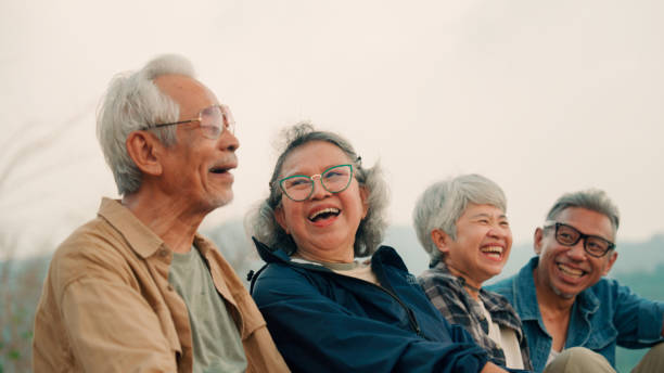 istock Happy multiracial senior  having fun together after hike on the mountain. 2155116803