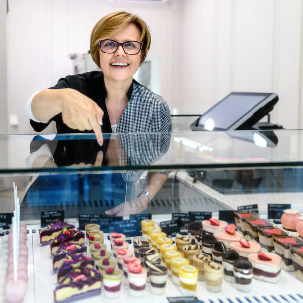 istock Proud confectioner is working in her pastry shop 2155117428