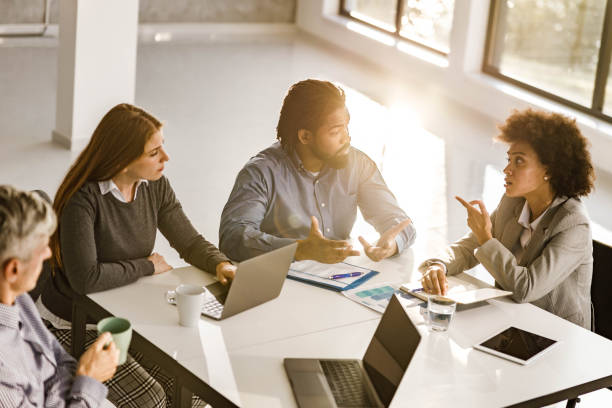 istock Business team talking on a meeting in the office. 2155117482