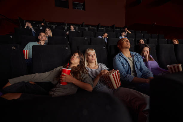 istock Watching a boring movie in theatre! 2155118618