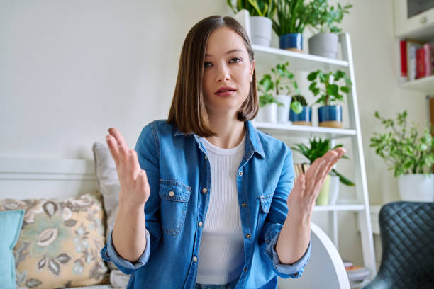 istock Web cam view of young attractive woman talking in home interior 2155120036