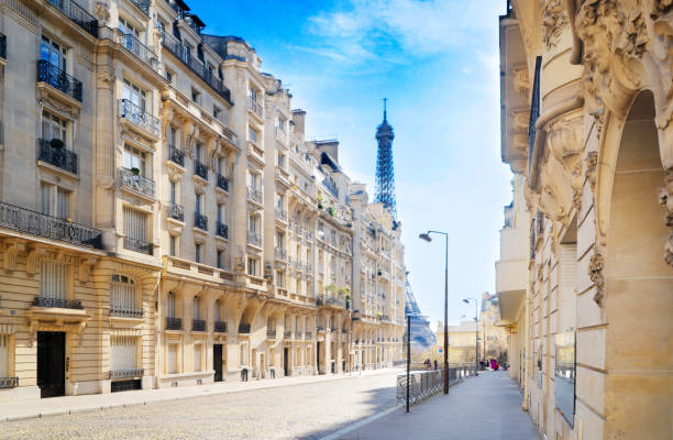 istock eiffel tour and Paris street 2155126190