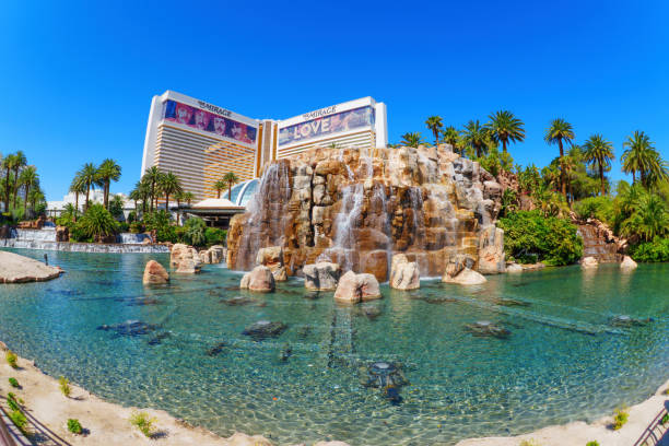 Las Vegas. USA. 10.25.2023. Beautiful view of Bellagio Hotel casino with fountains creating magical ambiance against backdrop of evening sky.