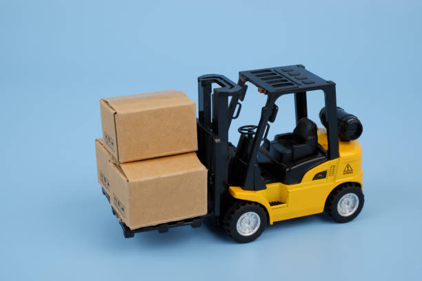 istock Forklift truck carrying carton boxes 2155129917