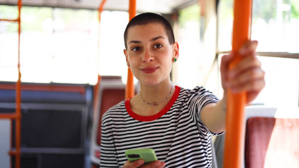 istock Girl surfing the net while riding in a bus 2155130996