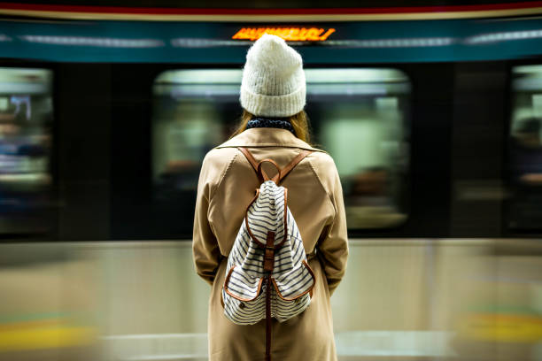Young woman waiting for the subway