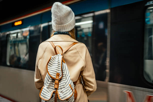 istock Young woman waiting for the subway 2155135705