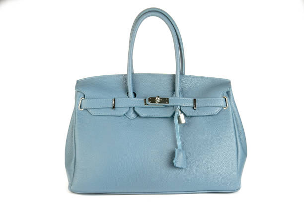 istock Blue fashion purse handbag on white background isolated 2155137099