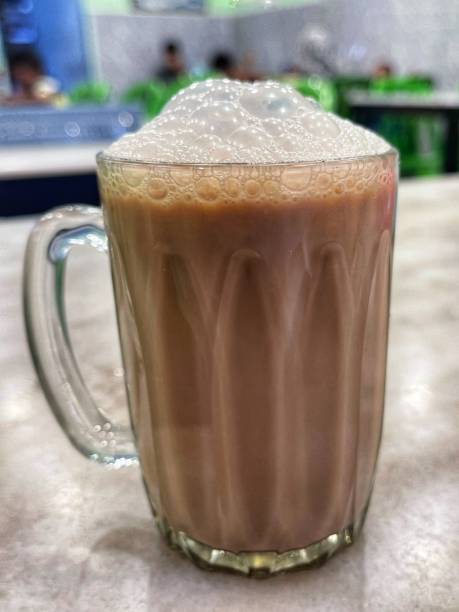 istock Tea with milk or popularly known as Teh Tarik in Malaysia. 2155141236
