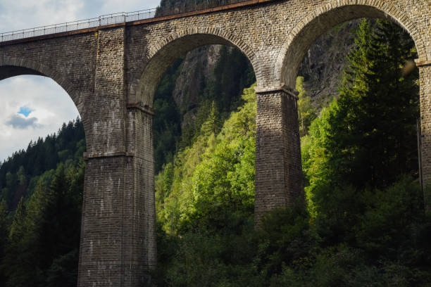 High arches on a bridge over the valley on a mountainside