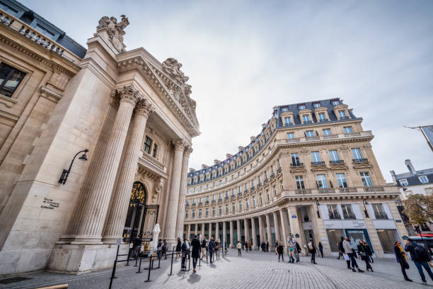 October 18, 2021 - Paris, France: The majestic Paris Bourse is framed by traditional buildings, highlighting the city's rich architectural heritage and economic significance.