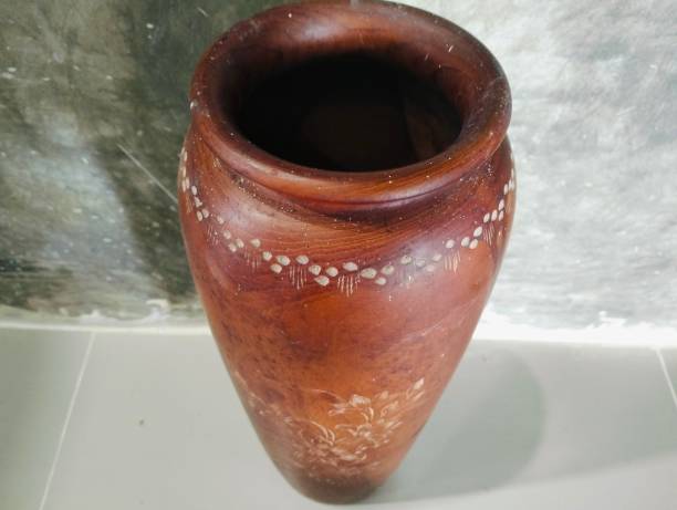 Traditional Indian handmade Items of Earthenware Or Ceramic at a Vendor Stall,decorative Sculpture Made with Earthen Mud, handcrafted traditional clay decoration toy in indian market
