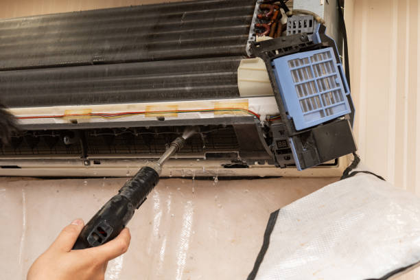 istock cleaning the air conditioner with chemical liquid 2155145034