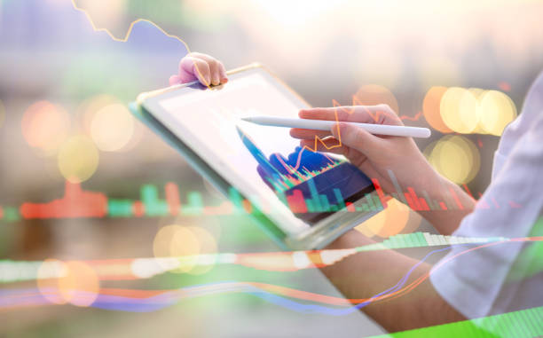 istock Modern women analysing finance data on smartphone with chatbot technology doing before buy fund with mobile app 2155149002