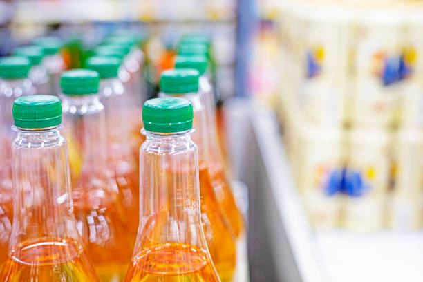 istock orange drinks in plastic containers on the counter in a supermarket 2155149046