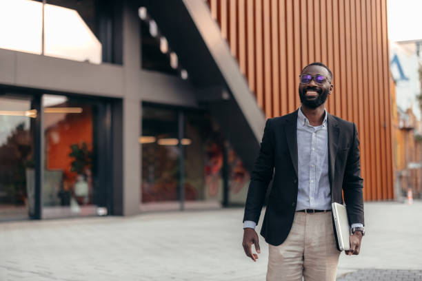 istock Afro American businessman with laptop 2155149101