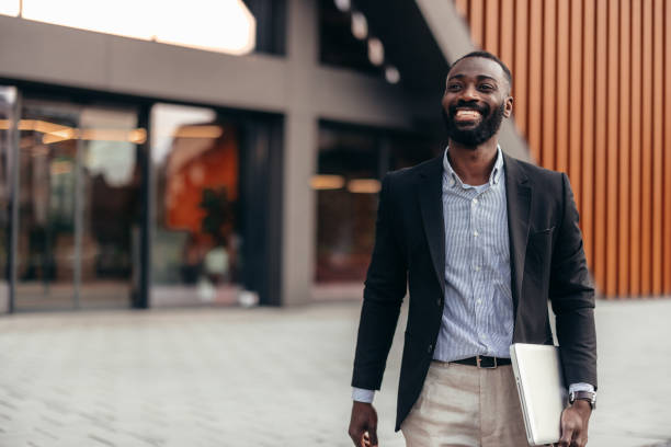 istock Afro American businessman with laptop 2155149103