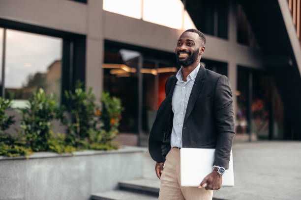 istock Afro American businessman with laptop 2155149106