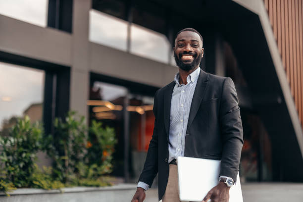 istock Afro American businessman with laptop 2155149107