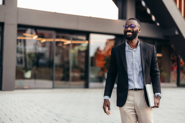 istock Afro American businessman with laptop 2155149145