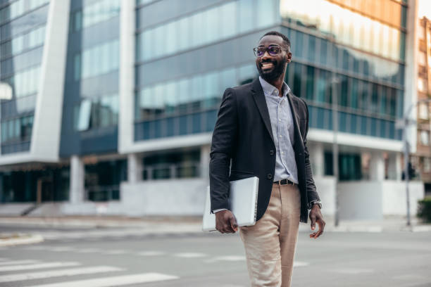 istock Afro American businessman with laptop 2155149148