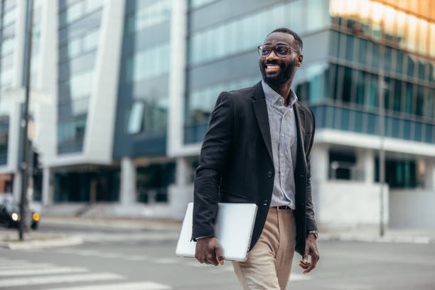 istock Afro American businessman with laptop 2155149158