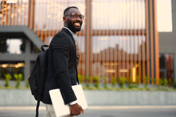 istock Afro American businessman with laptop 2155153934