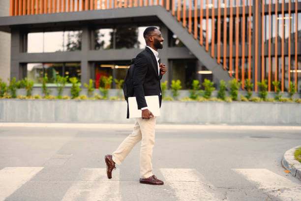 istock Afro American businessman with laptop 2155153935