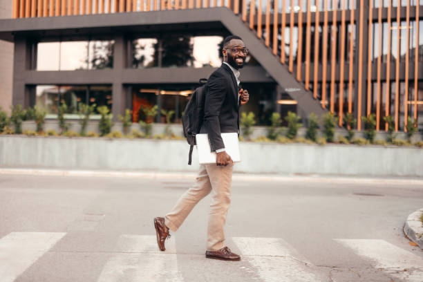 istock Afro American businessman with laptop 2155153936