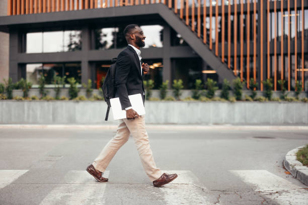 istock Afro American businessman with laptop 2155153945