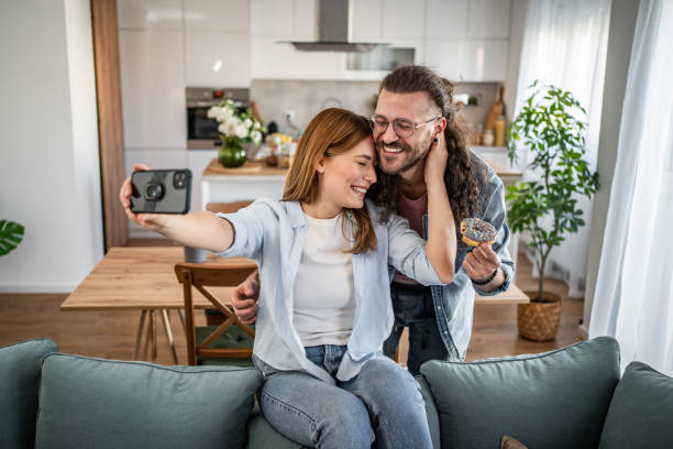 istock The couple enjoys delicious donuts 2155155206