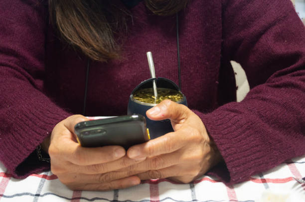 istock a lady looking at her cell phone 2155161147