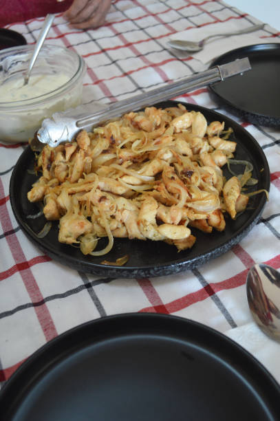 istock a gourmet chicken dish and a salad 2155161205