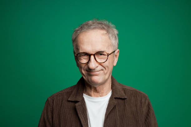 istock Headshot of happy senior man 2155161595